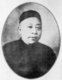 Born in 1868 in Suzhou, his father was a constable in Suzhou before the family migrated to Shanghai to open a teahouse. During his childhood, Huang contracted a bad case of smallpox. While his subordinates called him 'Grand Master Huang', behind his back everyone called him 'Pockmarked Huang'.<br/><br/>

Huang went to work at his father’s teahouse, which was not very far from the Zhengjia Bridge near the French Concession. The bridge in those days sheltered a large population of hustlers and crooks. Huang Jinrong fitted right in, and organised many of them into a gang who later became his sworn followers. Aged 24, Huang passed the entrance exams and entered the French Concession police force, the Garde Municipale in 1892. Being strong, brash and capable, he did very well and became a detective in the Criminal Justice Section (Police Judiciaire).<br/><br/>

With the exception of a brief sojourn to Suzhou, Huang served continuously in the Police Judiciaire for twenty years until his retirement in 1925 after several major scandals rocked the department. Although associated with gangs such as the Big Eight Mob, his public profile was always aligned with the police.